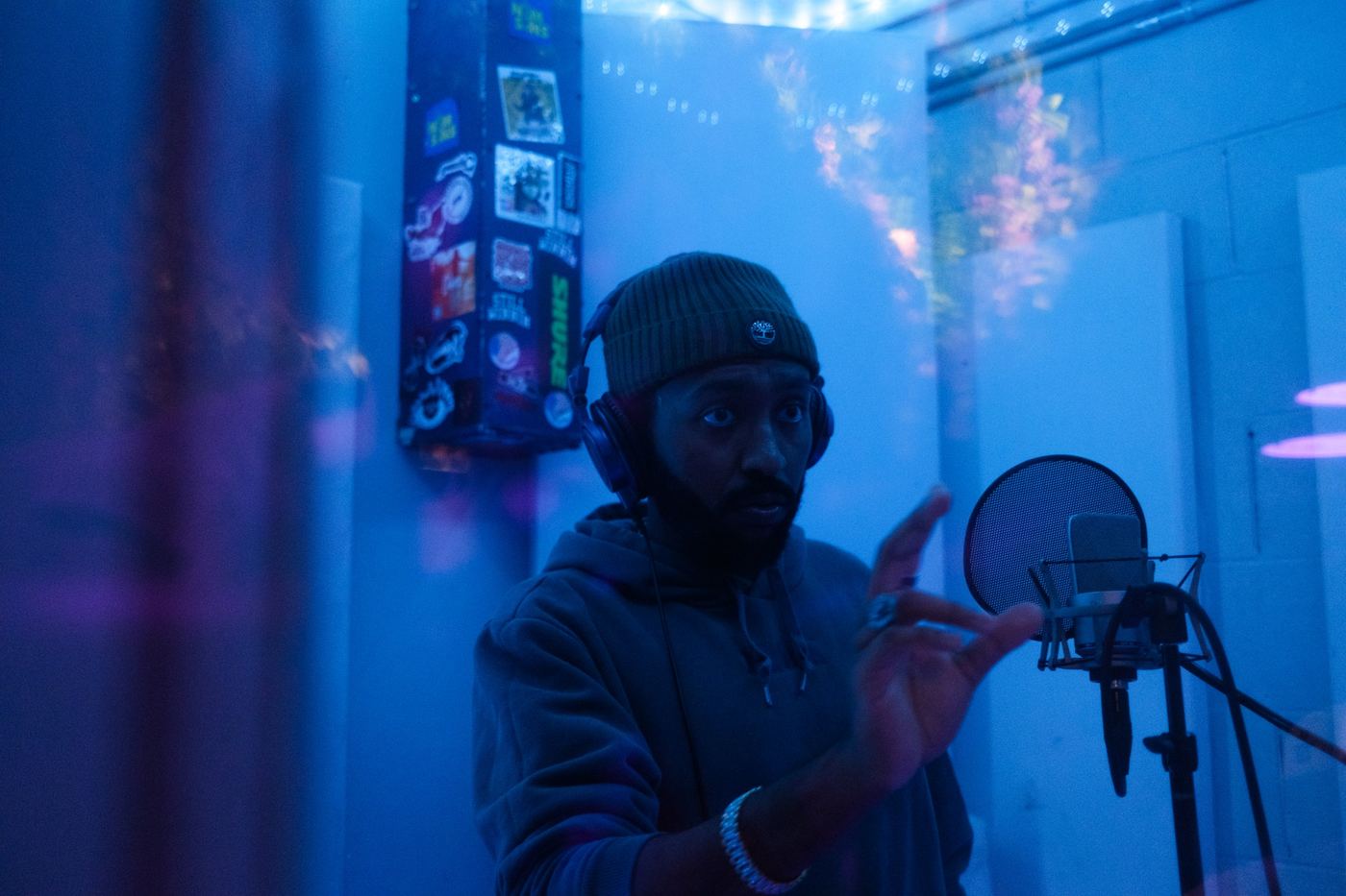Menasseh recording in the studio